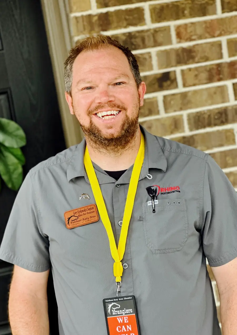 Gary Kirkowski wearing his Fulshear-Katy Area Chamber of Commerce Chaplain name badge and Wranglers lanyard